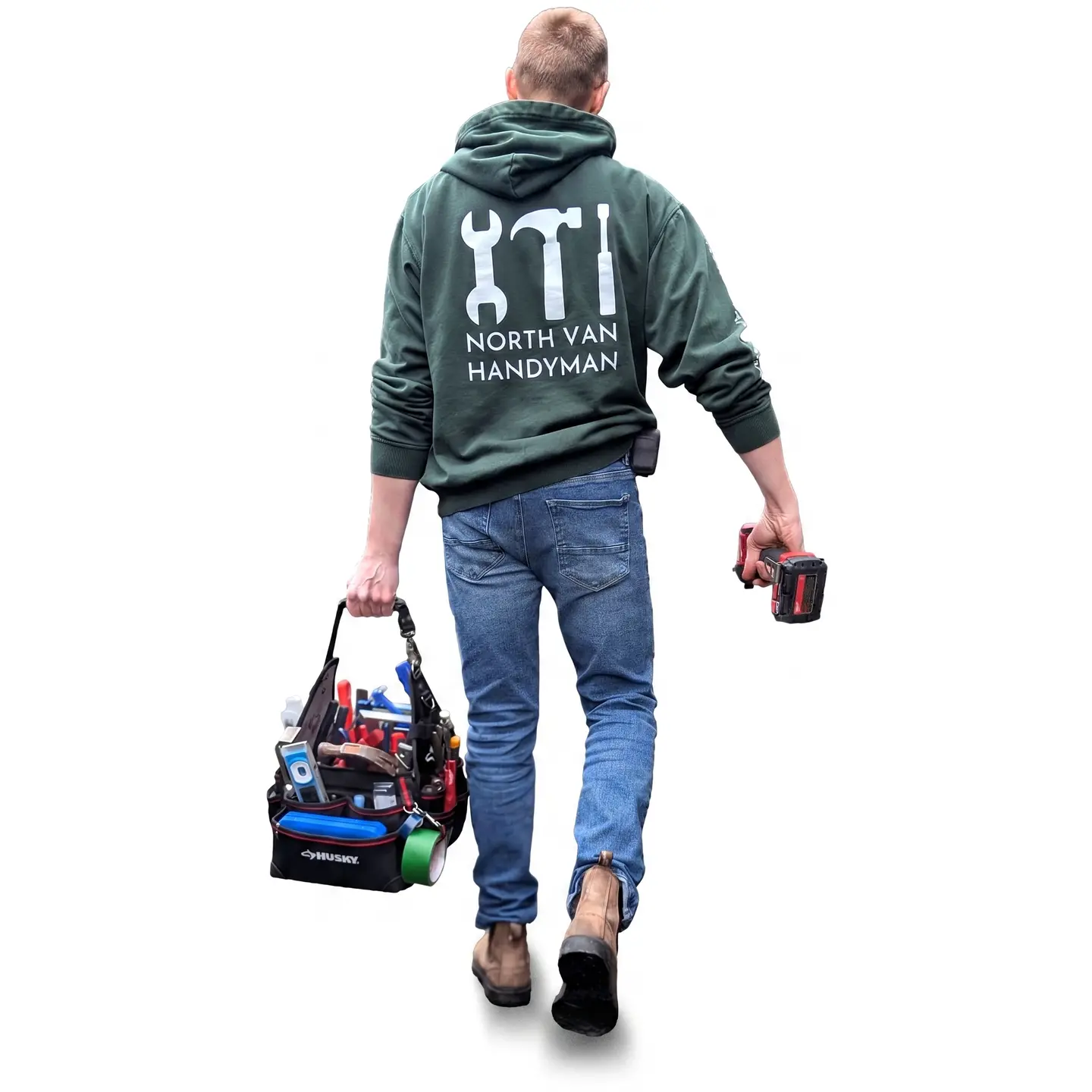 Leeve Comeau, owner of North Van Handyman, carrying his tool bag and drill