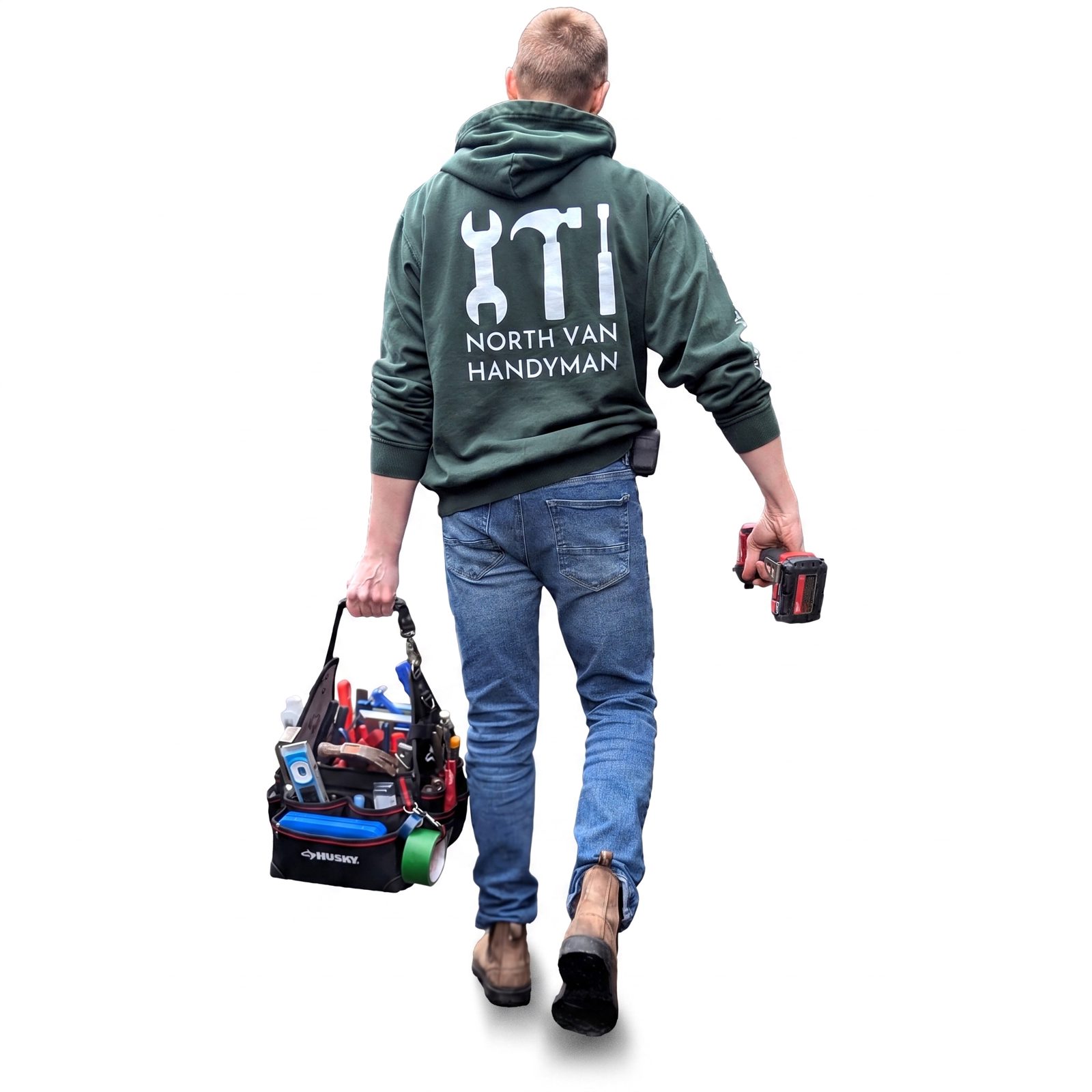 Leeve Comeau, owner of North Van Handyman, carrying his tool bag and drill
